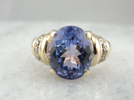 antique-inspired engagement ring for women-Indigo Purple Tanzanite and Diamond Ring in Yellow Gold