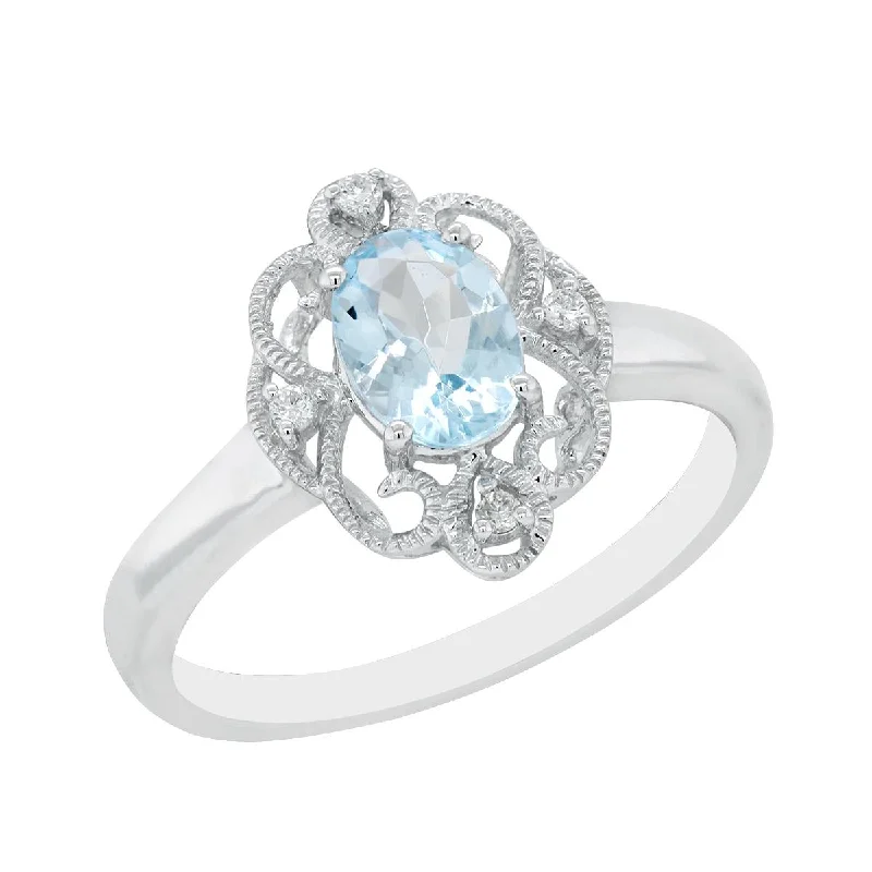 heart-shaped ladies ring-WHITE GOLD FASHION RING WITH OVAL CUT AQUAMARINE AND DIAMONDS, .04 CT TW