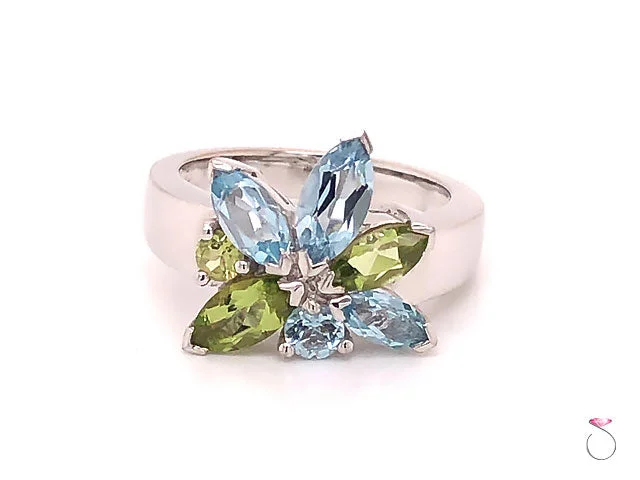 cushion-cut ladies ring-Louis Feraud Aquamarine and Peridot Cluster Ring