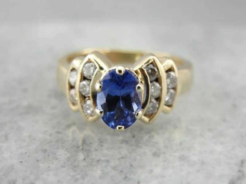 three-stone sapphire engagement ring for women-Sweeping Tanzanite and Diamond Ring for Day or Night