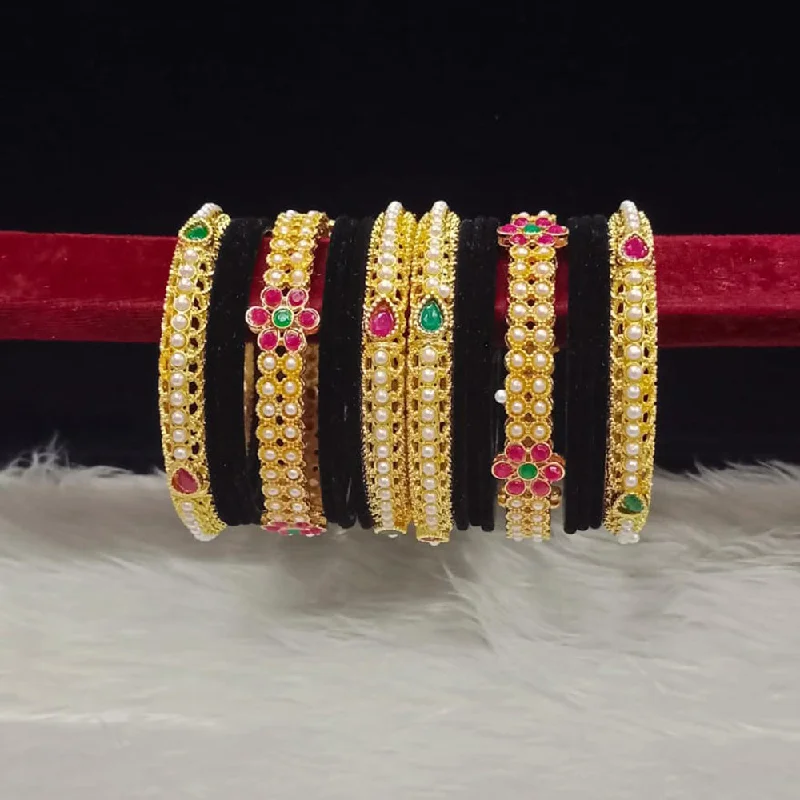 gemstone-accented ladies bracelet-Pooja Bangles Gold Plated Pota Stone And Pearls Velvet Bangles Set