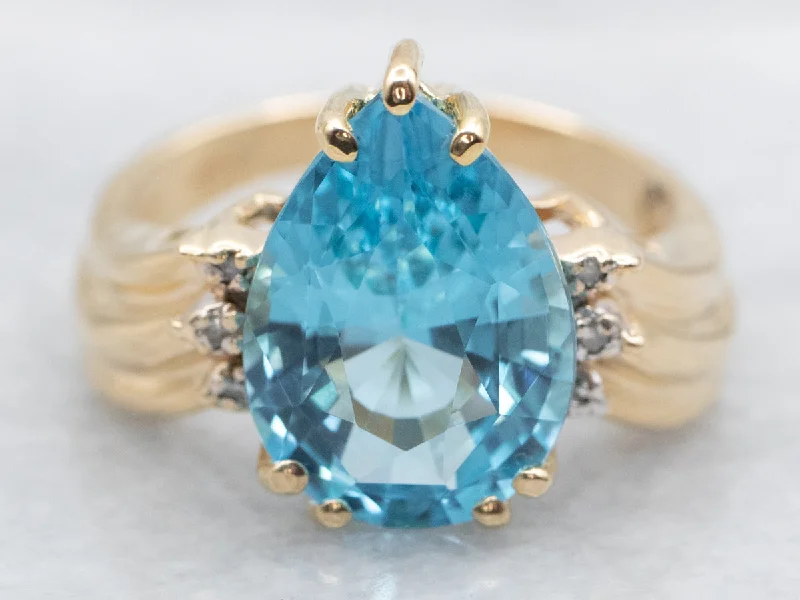 nature-inspired engagement ring for women-Pear Cut Blue Topaz and Diamond Ring